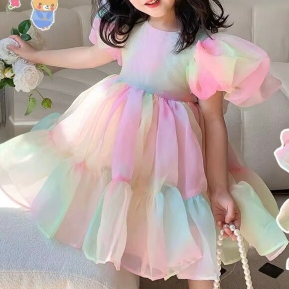 Elegant pastel princess dress with a flowing, voluminous skirt
